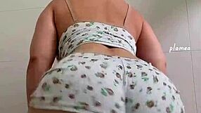 Latina in tight jeans shakes big ass and natural tits, daring you to peel off panties