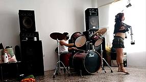 drummers play beats, she strips dancing and shakes huge ass