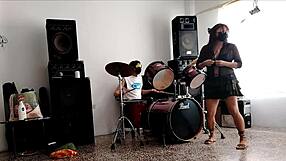 drummers play beats, she strips dancing and shakes huge ass