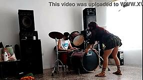 drummers play beats, she strips dancing and shakes huge ass