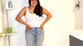 latina soaks her jeans and panties before stripping for messy shower!