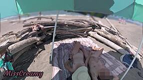 MISS CREAMY GIVES HANDJOB TO BIG COCK ON NUDITY BEACH AS EXHIBITIONIST WIFE IN PUBLIC