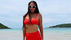Whoa cutie in orange bikini flashes tanned petite body fingering on crowded beach?!
