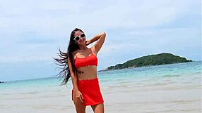 Whoa cutie in orange bikini flashes tanned petite body fingering on crowded beach?!