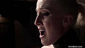 Blonde slave aches with desire in doggy bondage grip