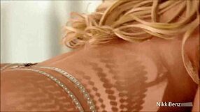 Nikki Benz Shakes Big Boobs While Dancing and Rubbing Her Massive Tits Seductively