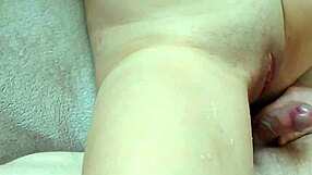 Young babe on bed squirts multiple times extreme with dildo close up
