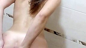 Teen masturbates shaved pussy closeup with dildo in steamy shower