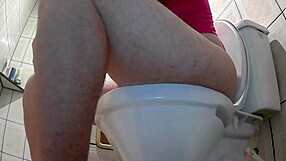 hidden cam catches femboy with huge ass sitting on toilet