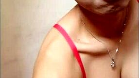 mitha waria ladyboy slips into red bra and strokes cock to cum