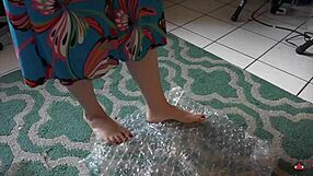 brunette nerd femdom dances barefoot playing with toes