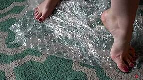 brunette nerd femdom dances barefoot playing with toes