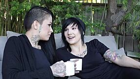Beautiful tattooed lesbo licks shaved pussy sucks strapon in heels