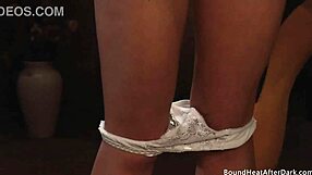 Bound blonde slave kisses and gropes mistress pussy in lesbian domination bliss