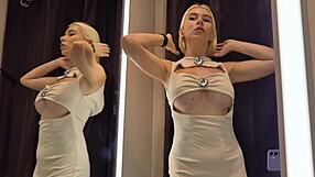 Ever caught a glimpse of big tits blonde trying on see-through sexy clothes naked in public changing room?