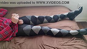 Shemale jerks off in plaid dress and argyle tights