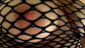 Fucking curvy milf in fishnets on the bed