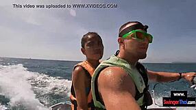 asian girlfriend blows on jetski