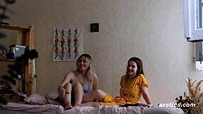 Hot babes take turns with the strap on