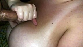 My wife strokes my cock nice and slow with her natural tits out