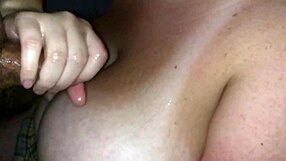 My wife strokes my cock nice and slow with her natural tits out