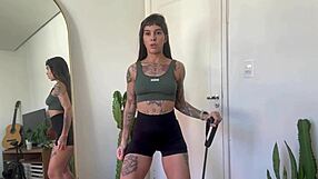 Inked girl rubber band workout warm up strength sfw yoga fitness