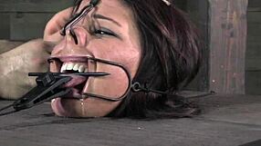 Mouth gagged bitch in bastinado session