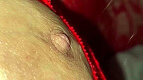 Latina in red bodysuit fingers her wet pussy