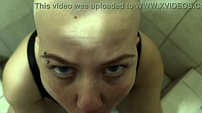 bald chick blows a dick in the club party restroom