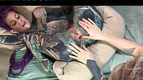 Dreadlocks and tattoos girl does latex anal fisting solo