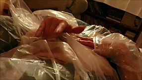 fetish madame birgit in plastic wanking with alan mutual orgasms