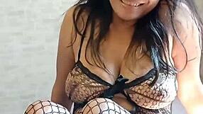 Thaiger posing in lingerie showing big natural tits.