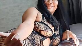 Thaiger posing in lingerie showing big natural tits.