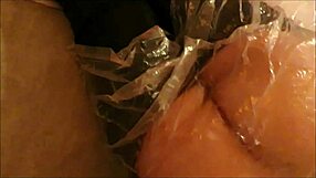fetish madame birgit in plastic wanking with alan mutual orgasms
