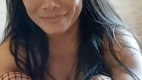 Thaiger posing in lingerie showing big natural tits.