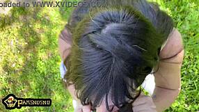 Big titted slut sucks cock in public