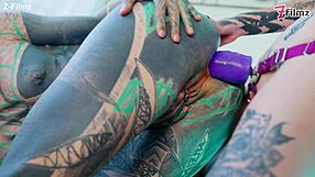 tattooed lesbians fuck with anal dildo