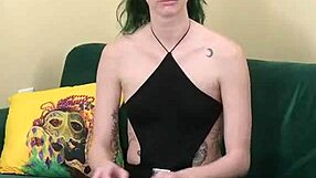 Kit Summers appears in black bodysuit with gothic miniskirt