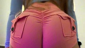 latina moving in tight shorts during workout
