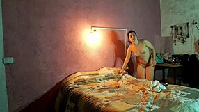 Spanish babe rubs her pussy